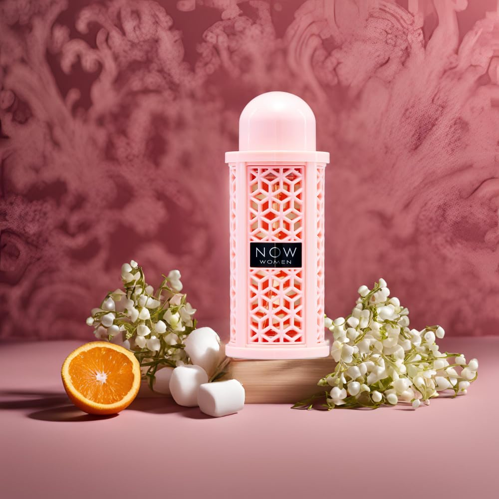 Lattafa Rave Now on vanity with flowers suggesting feminine everyday wear