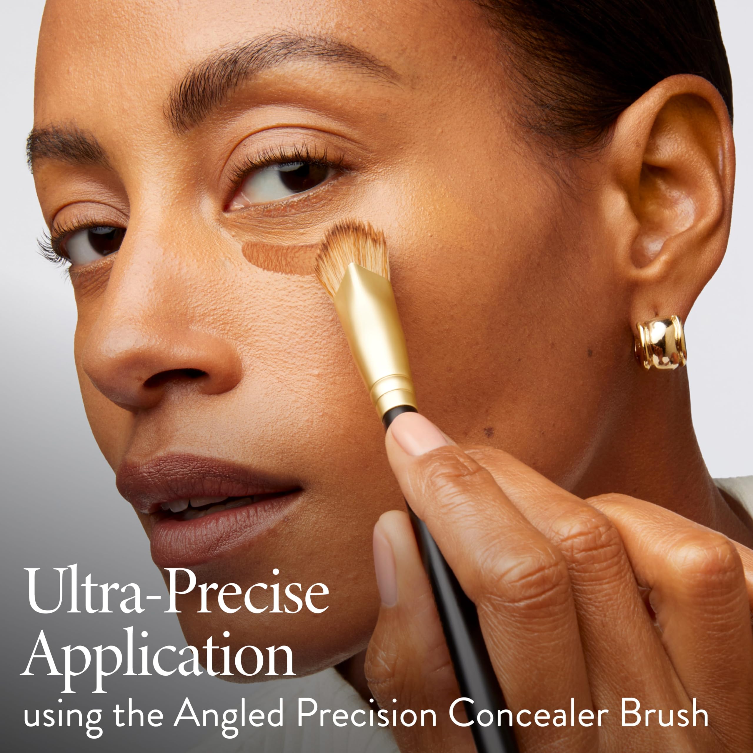 LAURA GELLER concealer next to foundation to show multi-use versatility