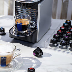 Lavazza espresso shot pouring with crema showcasing rich extraction benefit