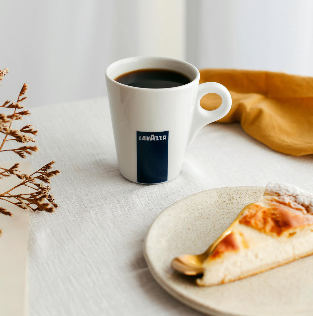 Lavazza cup served to show rich crema and tasting profile for immediate appeal