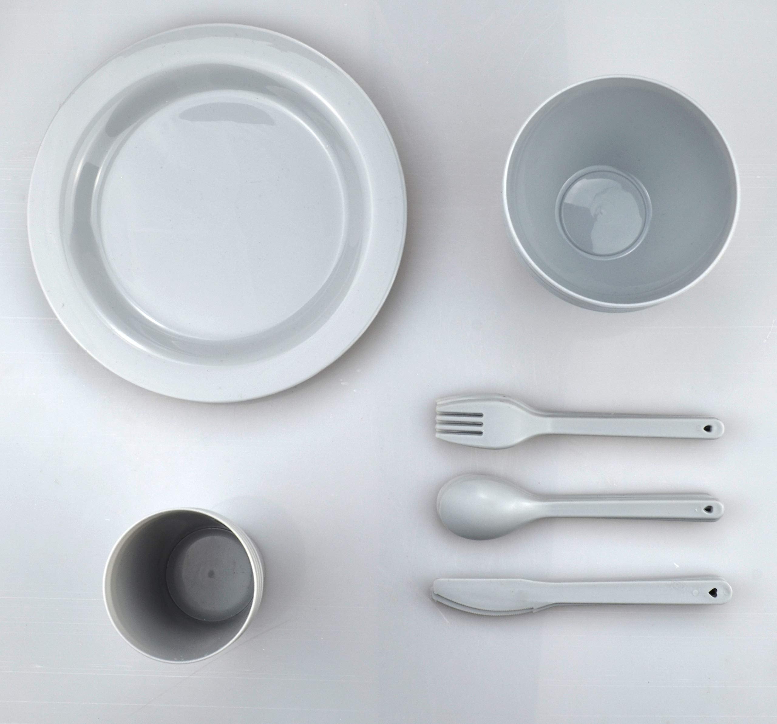 Layron bowls and cups arranged to show stackability and space-saving benefit