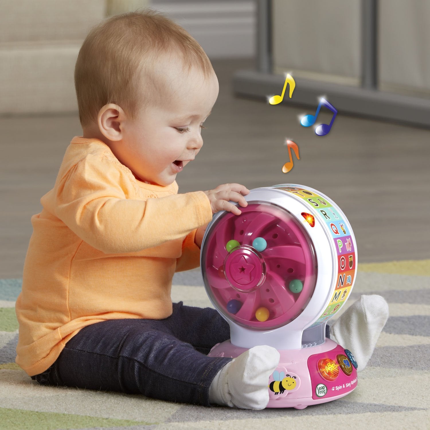 LeapFrog size comparison with child hands to show toy scale and safety