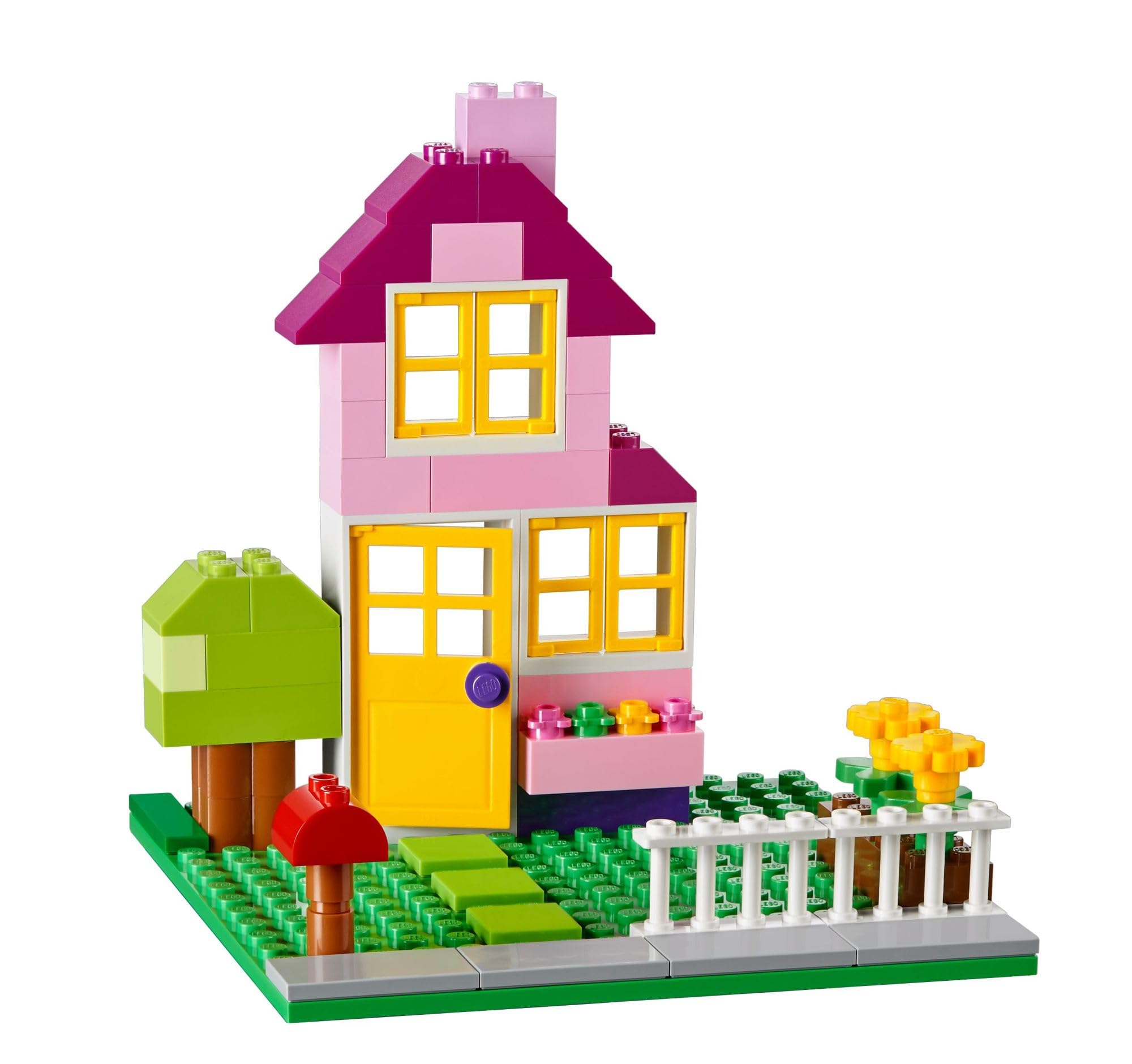 LEGO child building with the set to boost fine motor skills and imagination