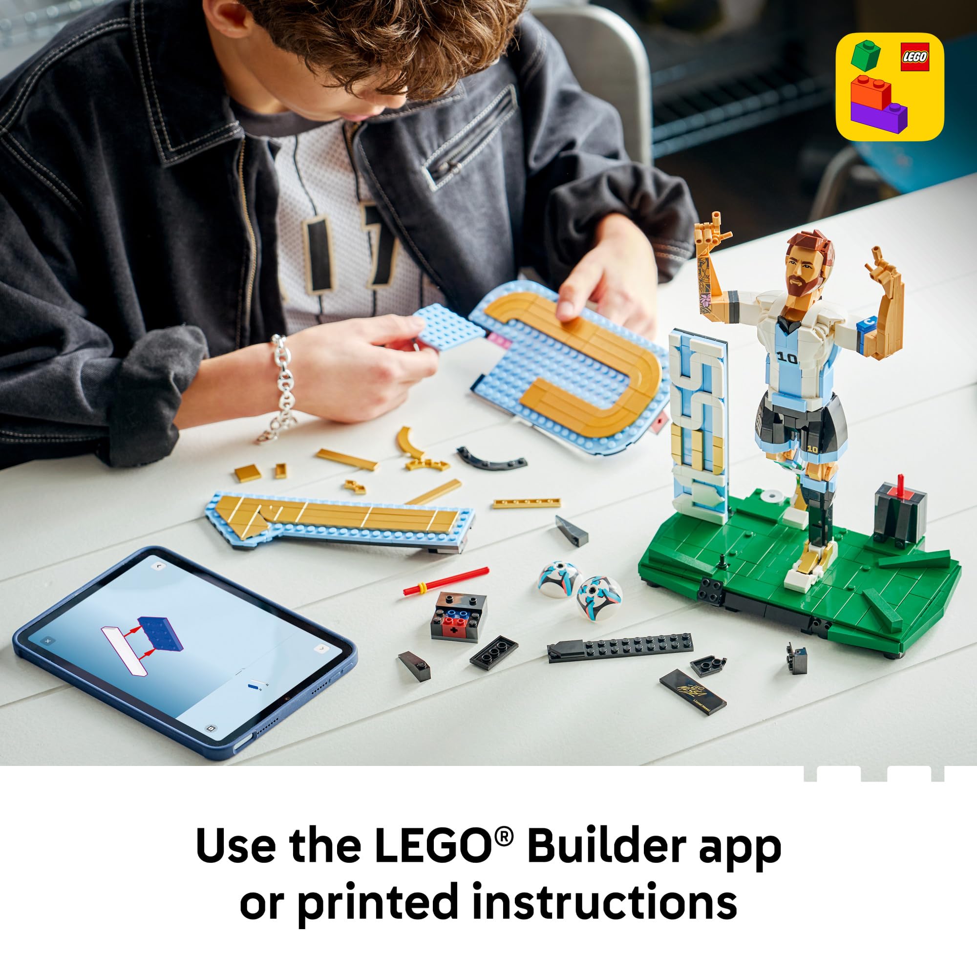 LEGO Lionel Messi next to a hand for scale showing brand accurate size reference