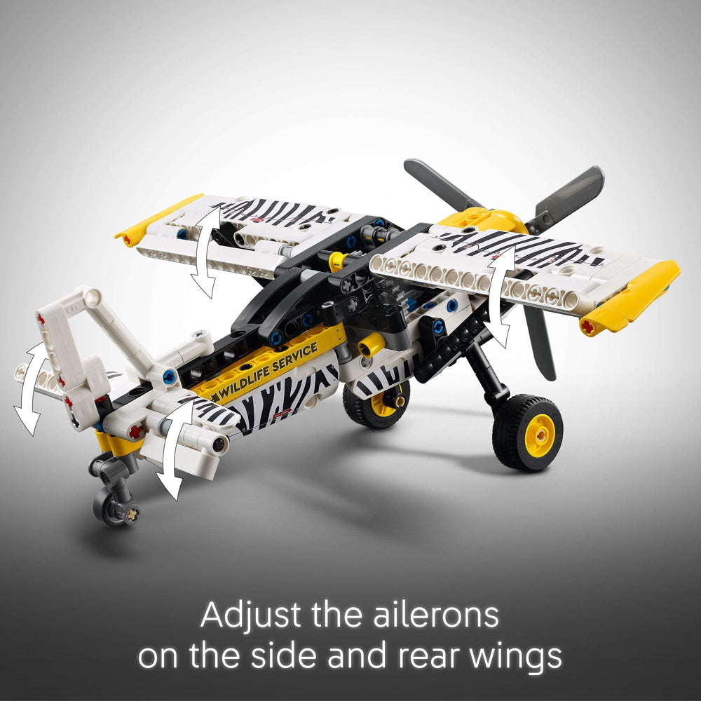 LEGO Technic bush plane scale with hand to show size and easy handling