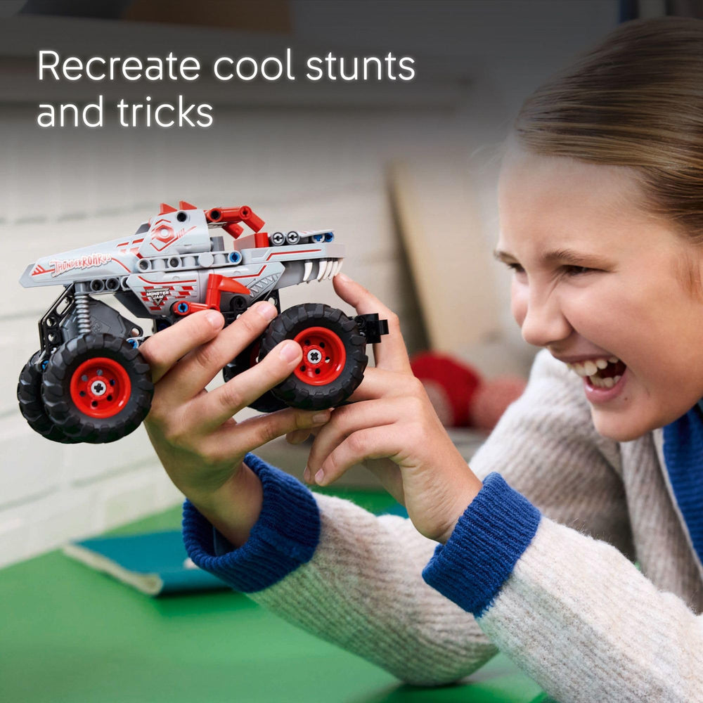 LEGO ThunderROARus next to hand to show scale and easy portability benefit