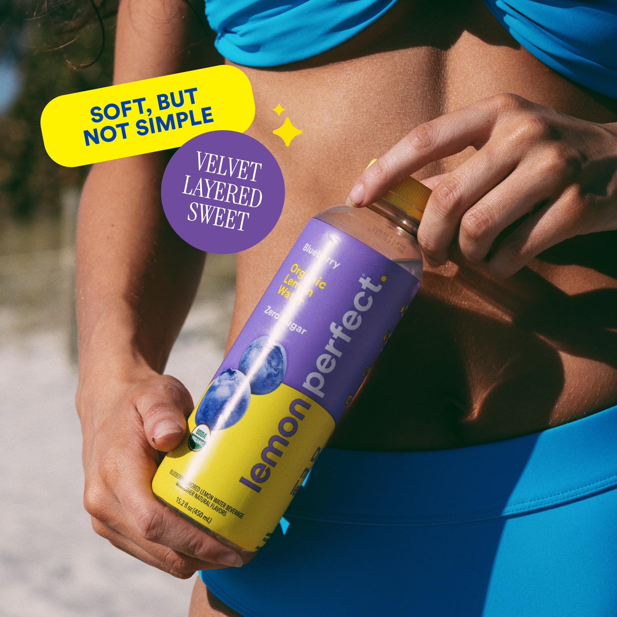 Lemon Perfect pouring into glass illustrating clear hydration and vibrant flavor