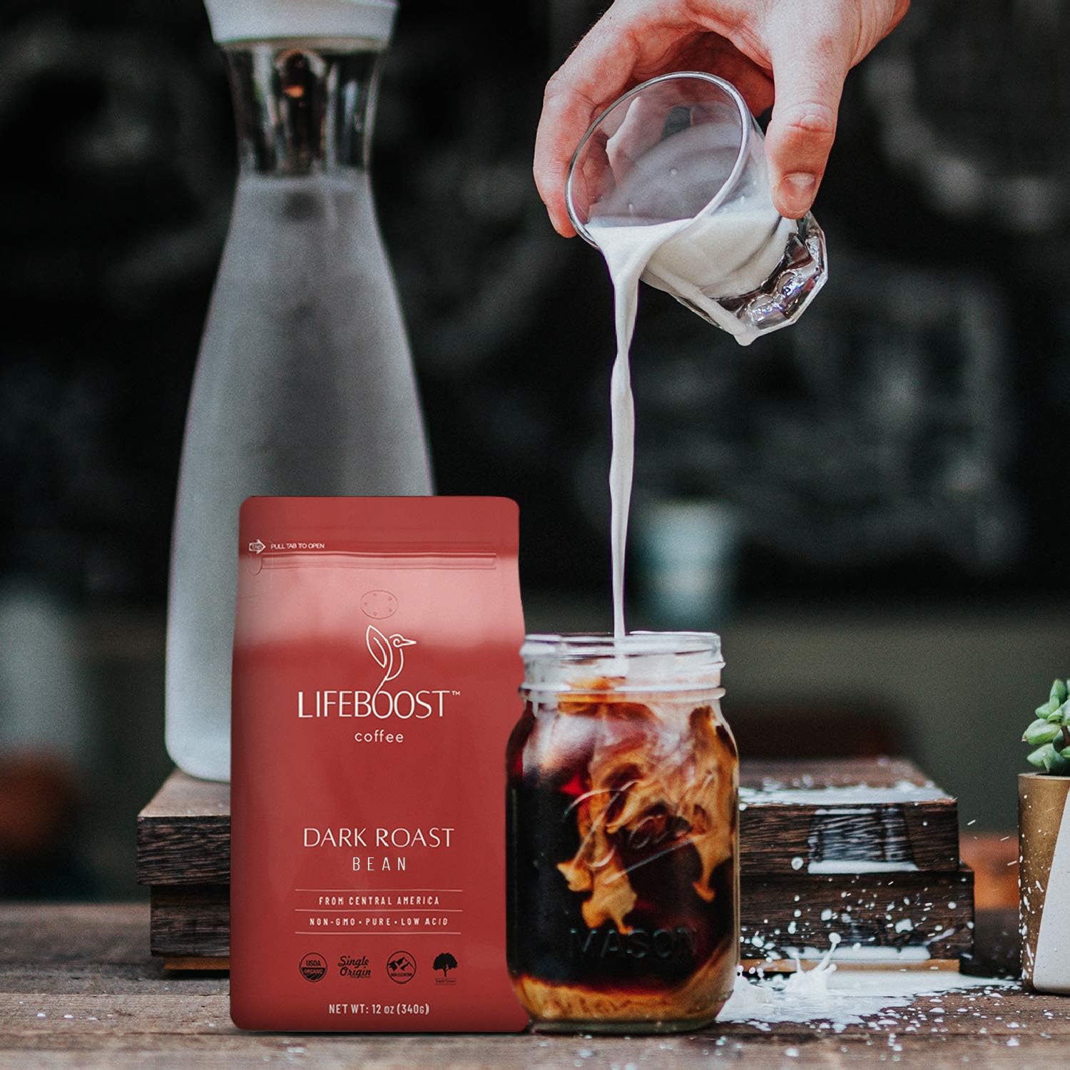 Lifeboost grounds pouring into filter illustrating easy brewing and bold flavor