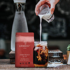 Lifeboost grounds pouring into filter illustrating easy brewing and bold flavor