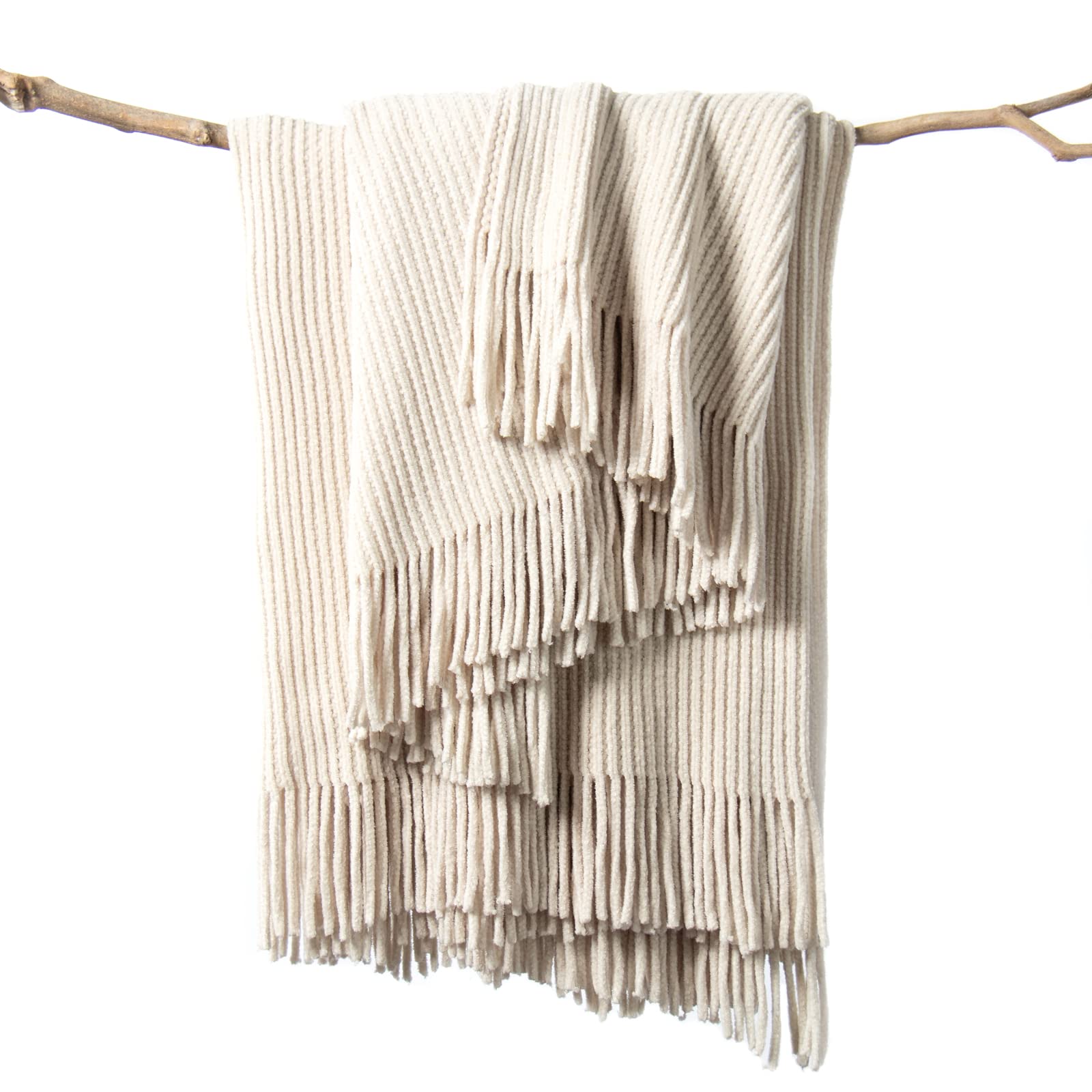 lifein front view of cream throw blanket showing clean styling and cozy appeal