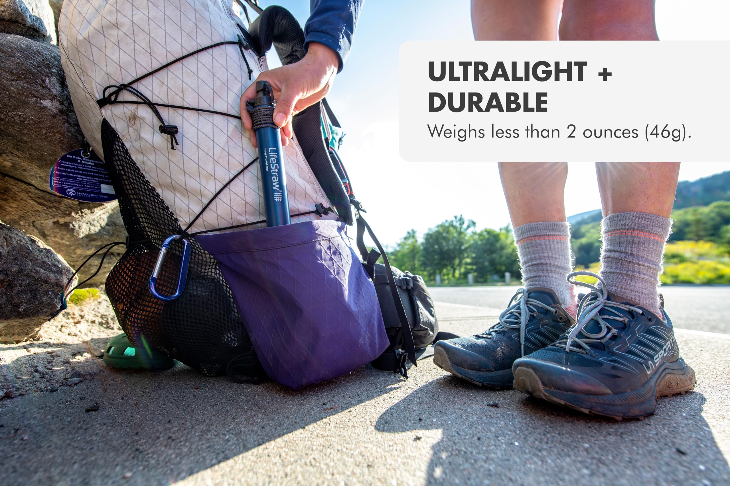 LifeStraw beside a hiking pack showing outdoor-ready convenience benefit