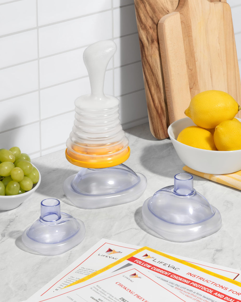 LifeVac held in hand for scale, highlighting compact portable design