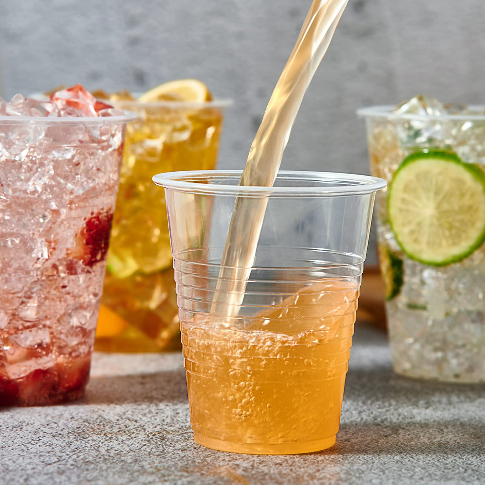 Lilymicky cups in use at party enabling hygienic single-use serving