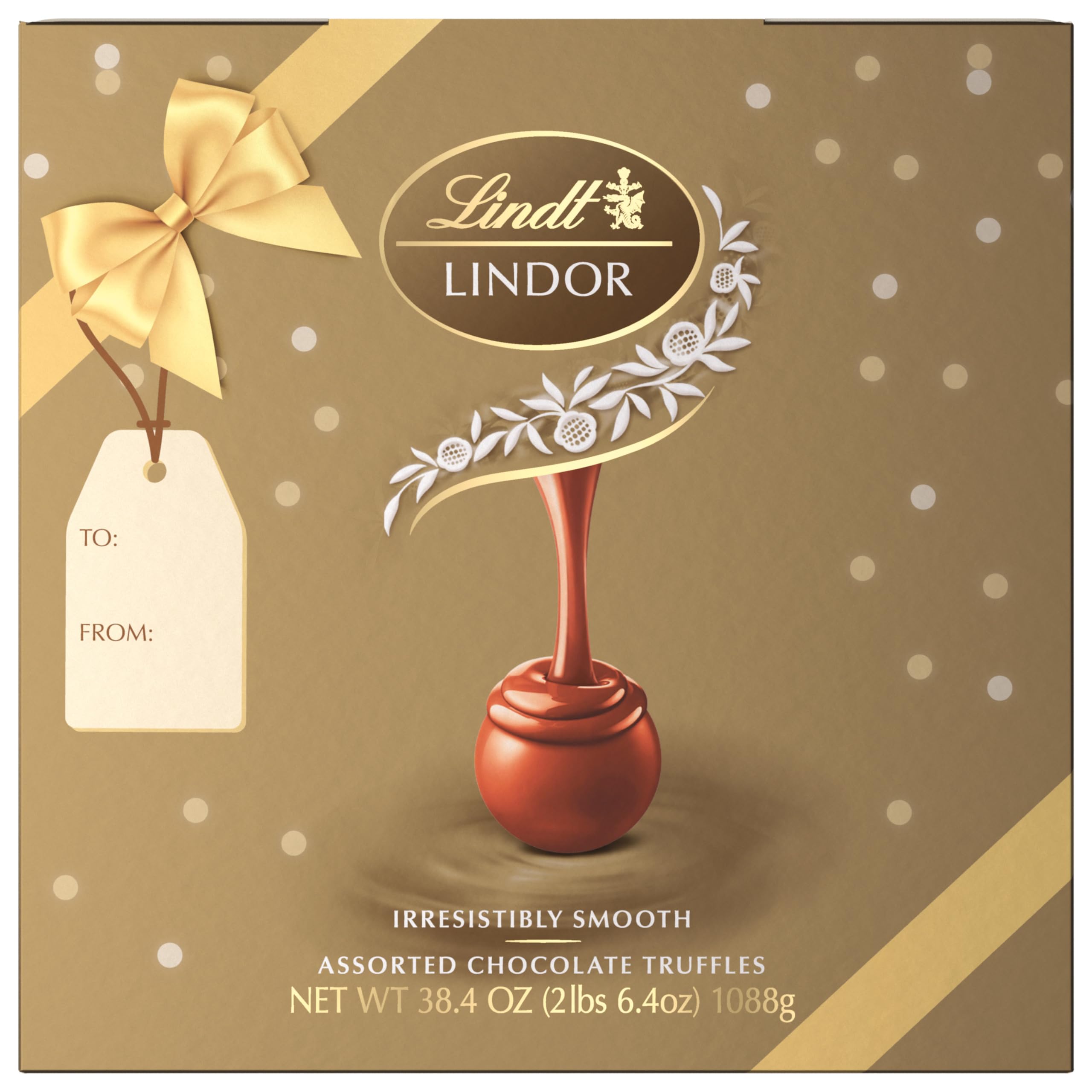 Lindt LINDOR truffle in hand showing scale and portioning benefit