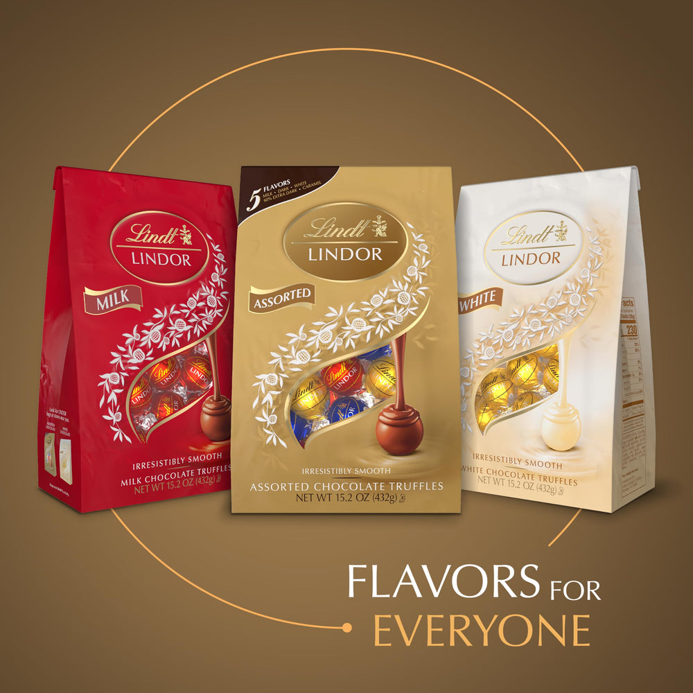 Lindt LINDOR truffles in hand demonstrating scale and single-serve portion