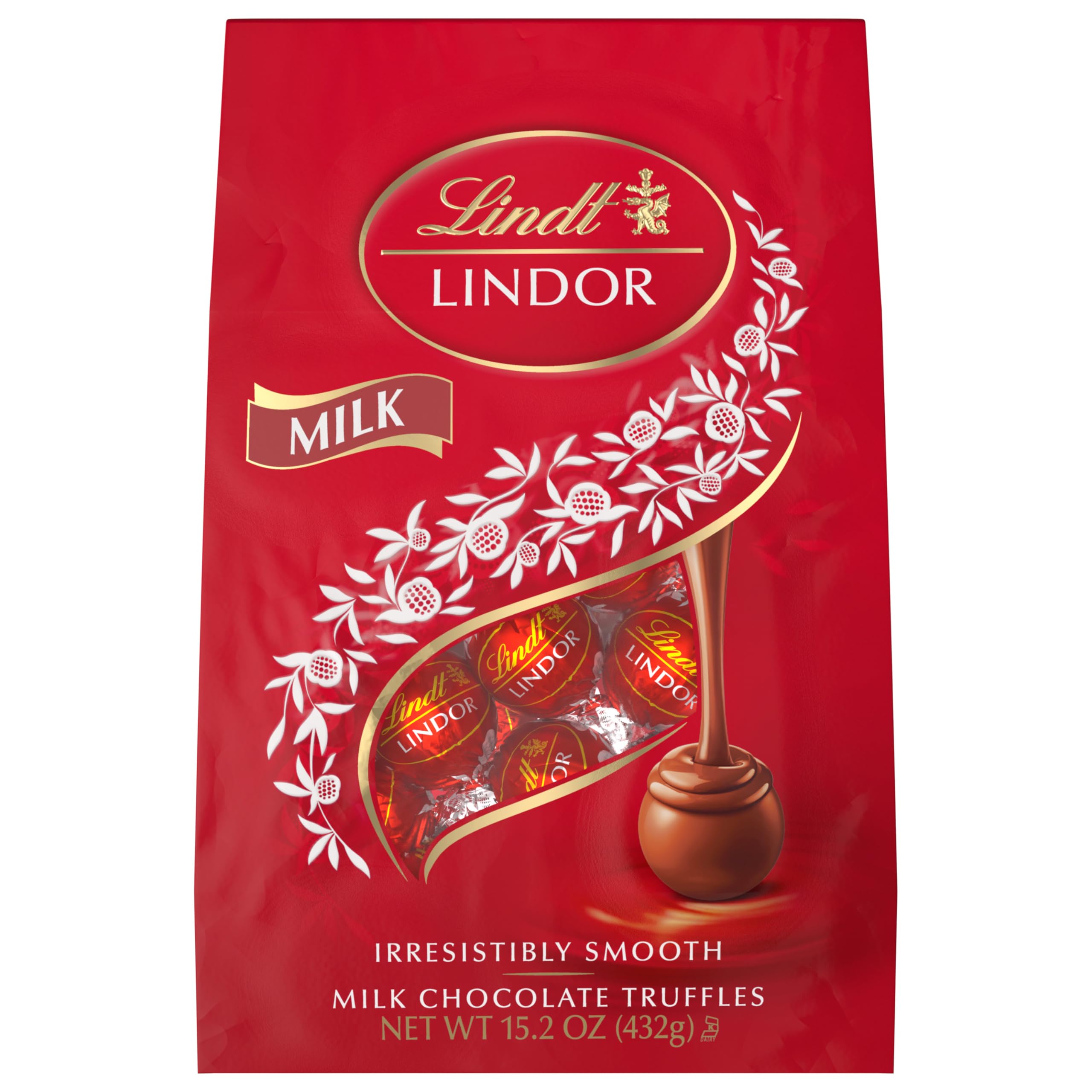 Hand holding Lindt truffle illustrating bite-size portion and convenience
