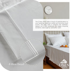 Linen Home fitted sheet deep pocket detail showing secure fit up to 16"