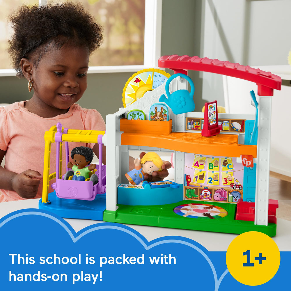 Little People close-up of classroom flip table showing snack and craft scenes