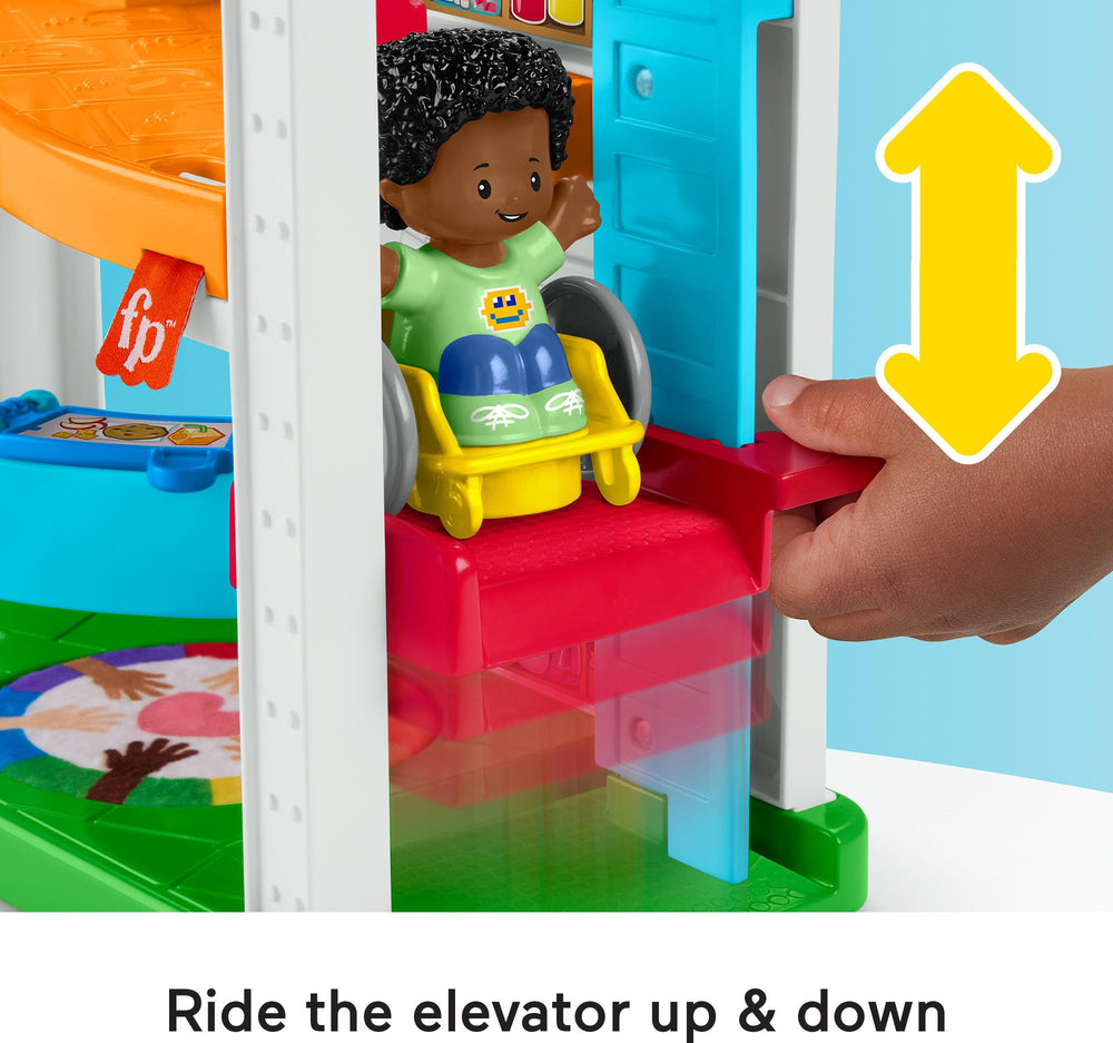 Little People image of wheelchair-accessible swing demonstrating inclusive play