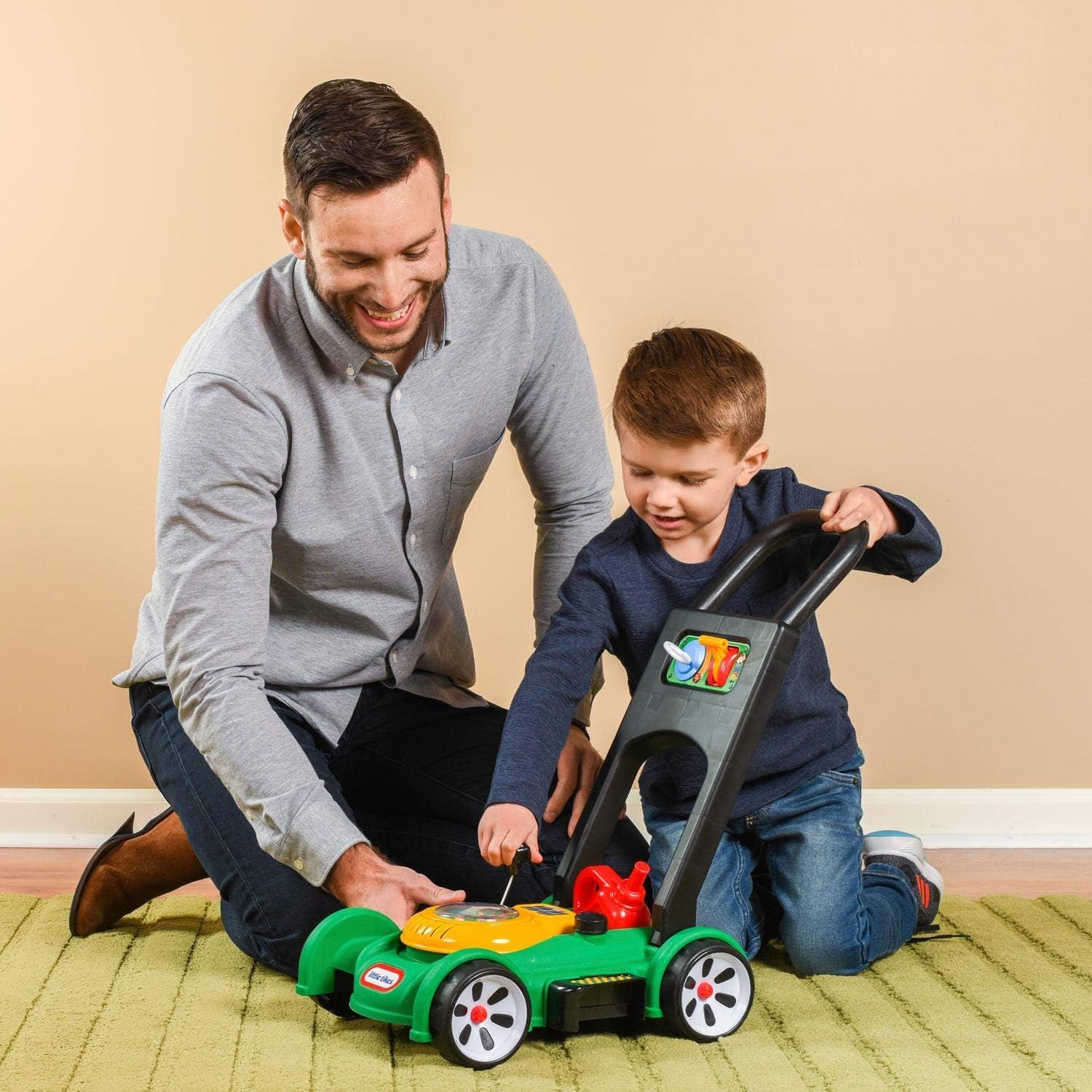 Little Tikes mower pull-cord detail demonstrating engine sound interaction