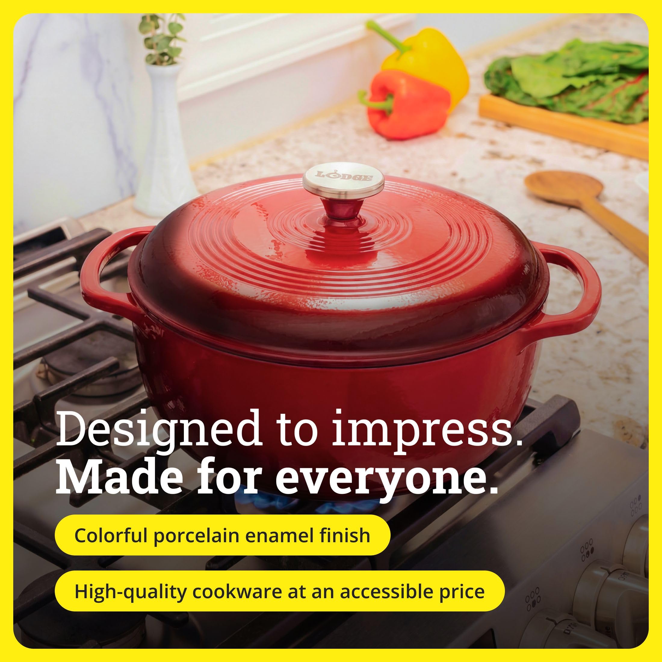 Lodge Dutch oven next to utensils for scale illustrating the 6-quart family size capacity