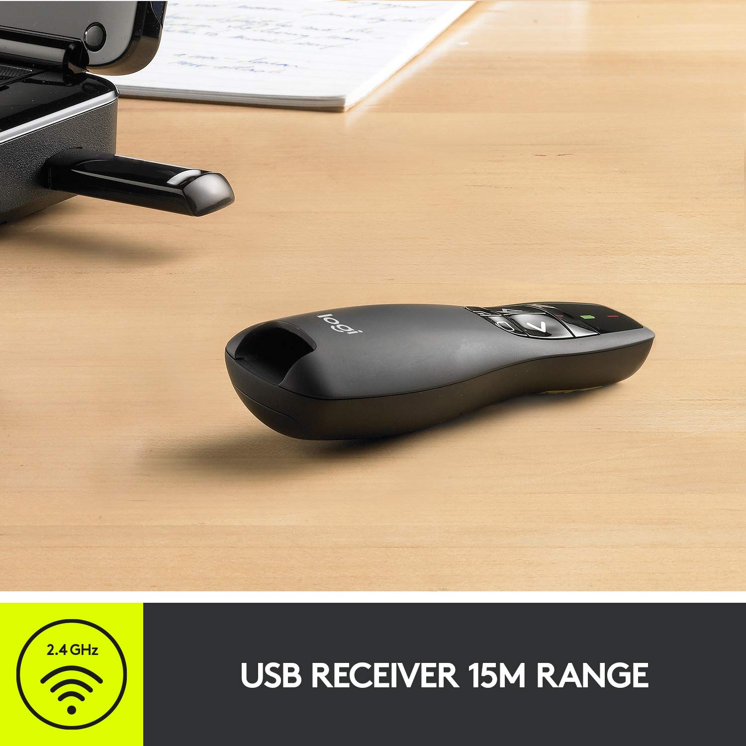 Logitech R400 held in hand to show compact scale and comfortable grip during talks
