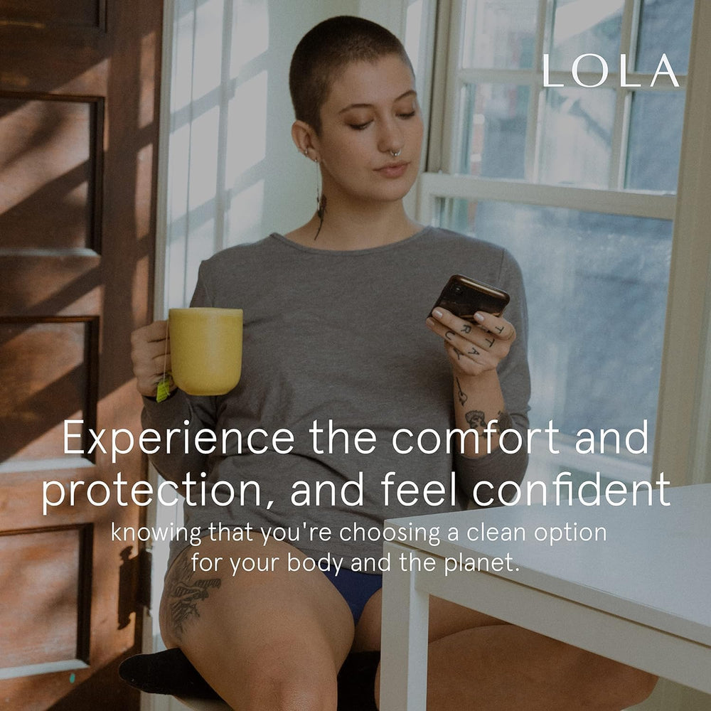 LOLA lifestyle shot of active woman showing confidence during activity