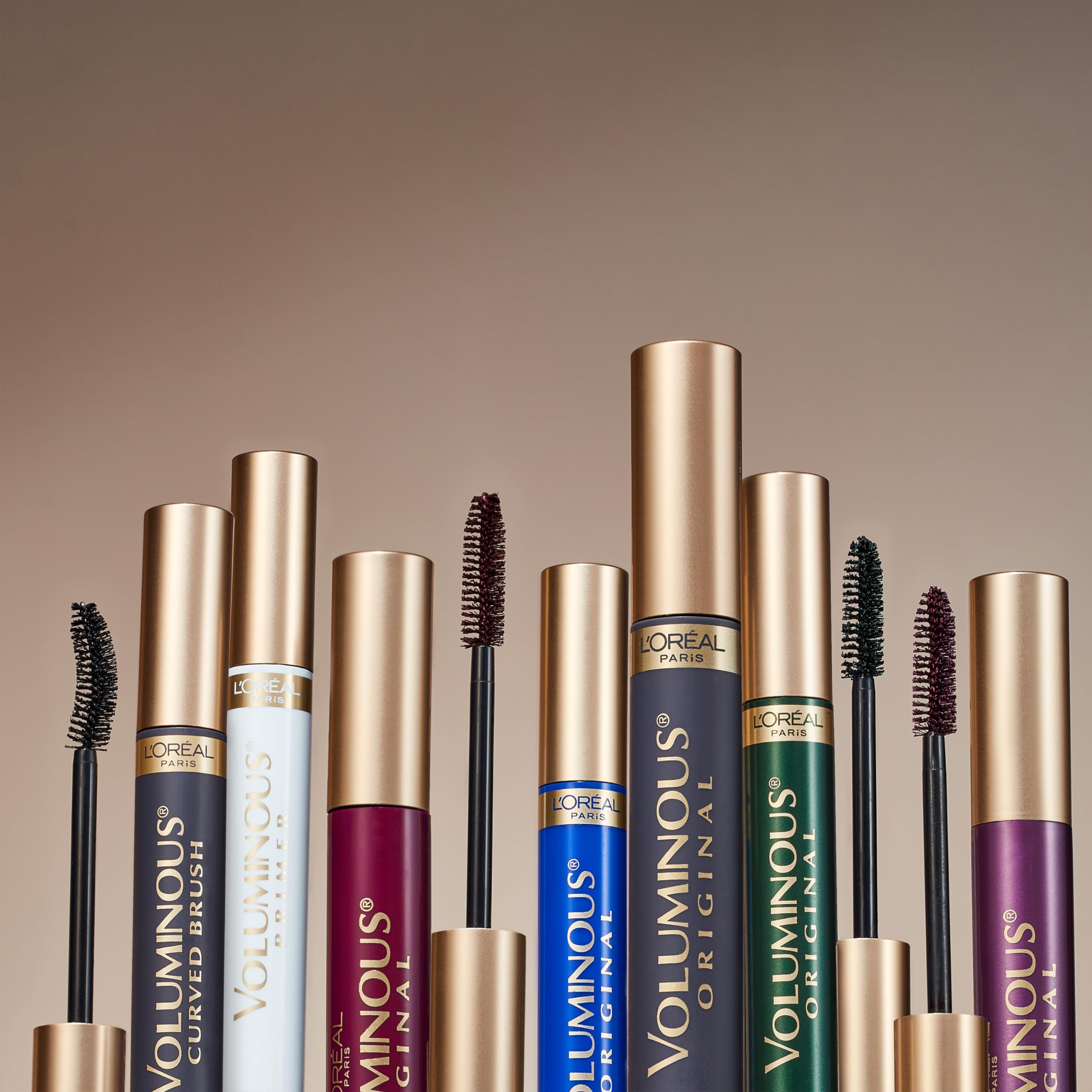 L'Oreal Paris brush with cap removed, highlights durable applicator design benefit