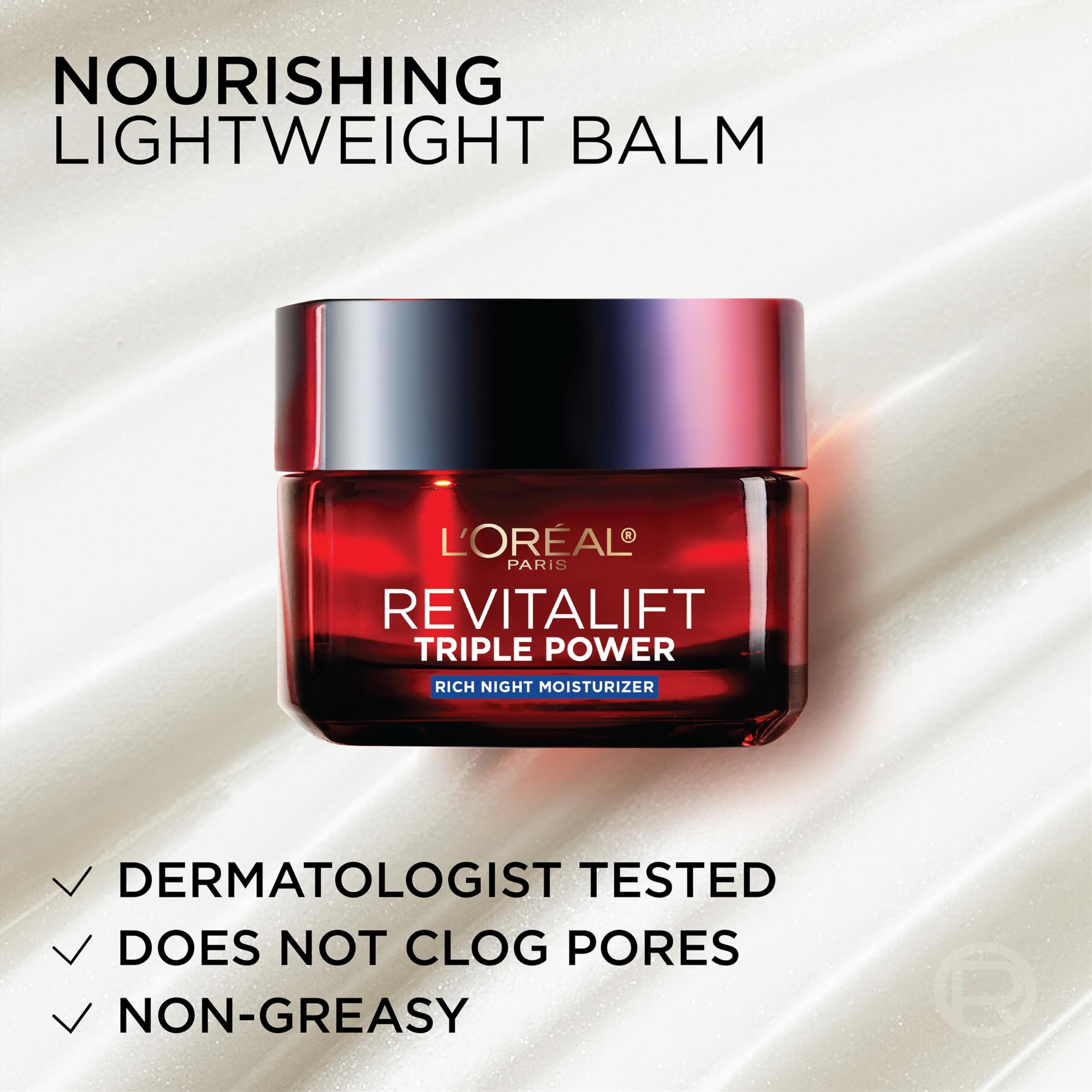 L'Oreal Paris jar on bedside table illustrating nightly skincare ritual benefit
