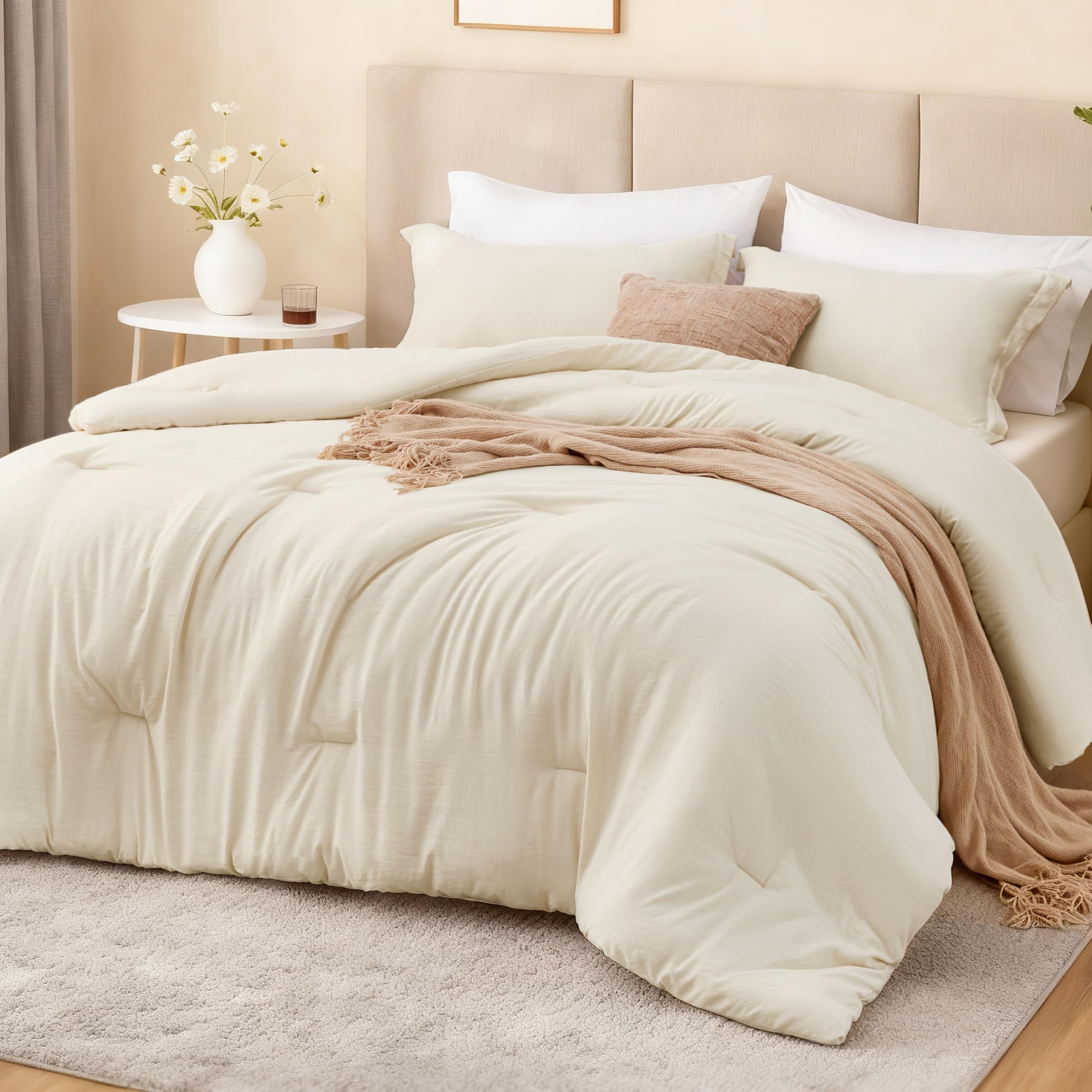 Love's cabin front view of beige comforter on bed showing neat fit and calm aesthetic