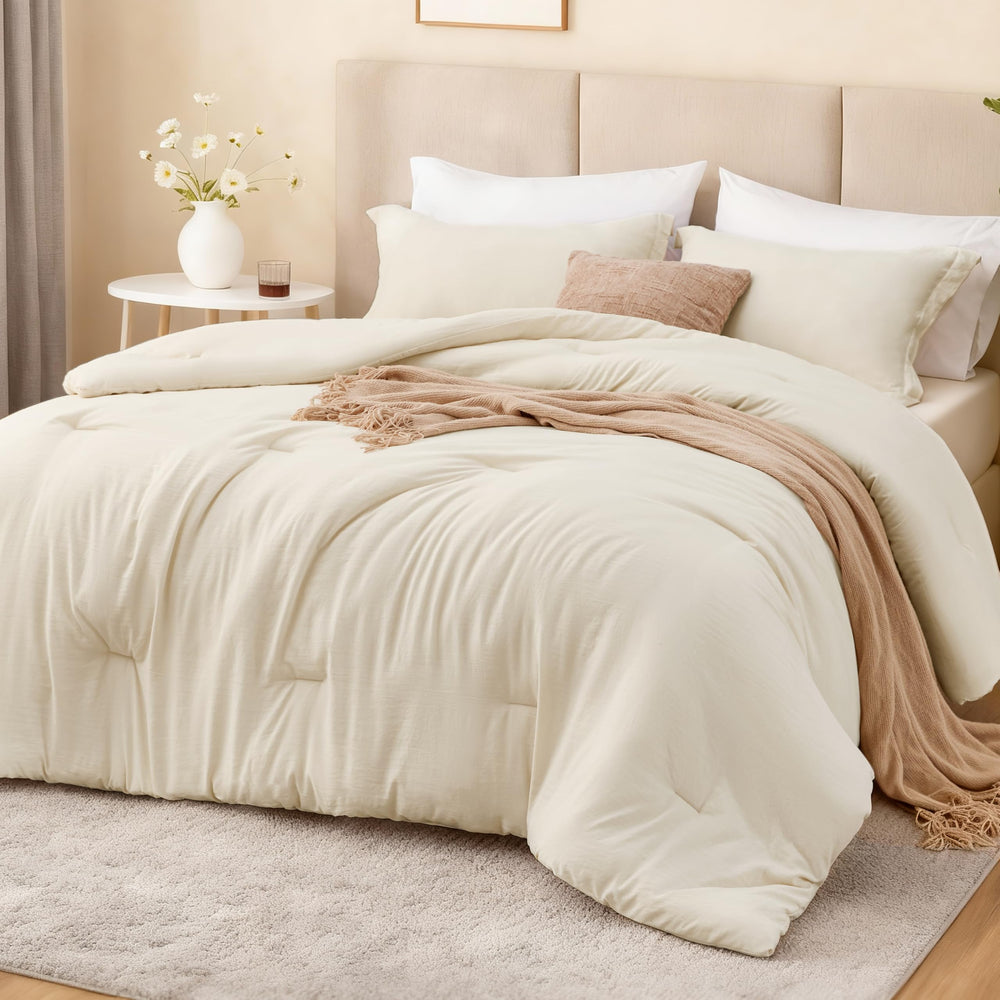 Love's cabin front view of beige comforter on bed showing neat fit and calm aesthetic