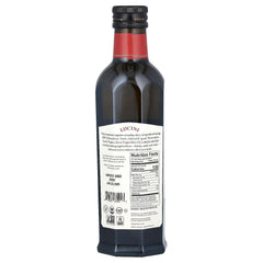 Lucini oil pouring from bottle close-up highlighting smooth texture and fresh flavor benefit