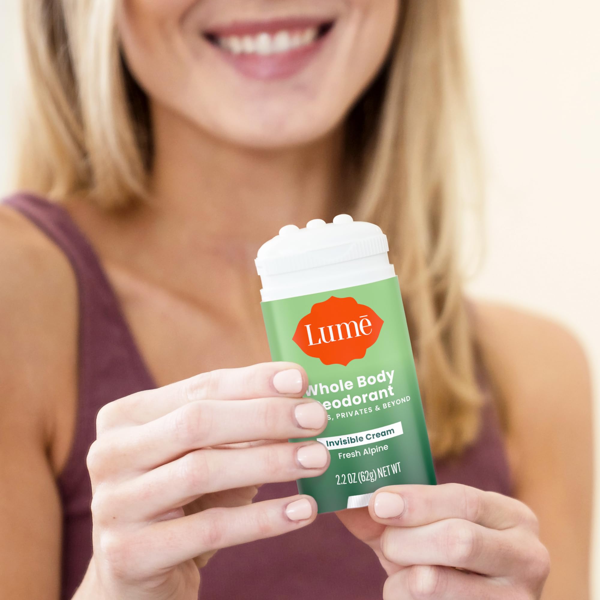 Lume used on feet in lifestyle shot showing versatile odor control benefit