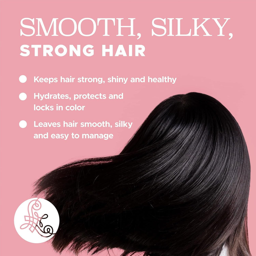 Luseta conditioner being applied to hair lengths for smoothness benefit