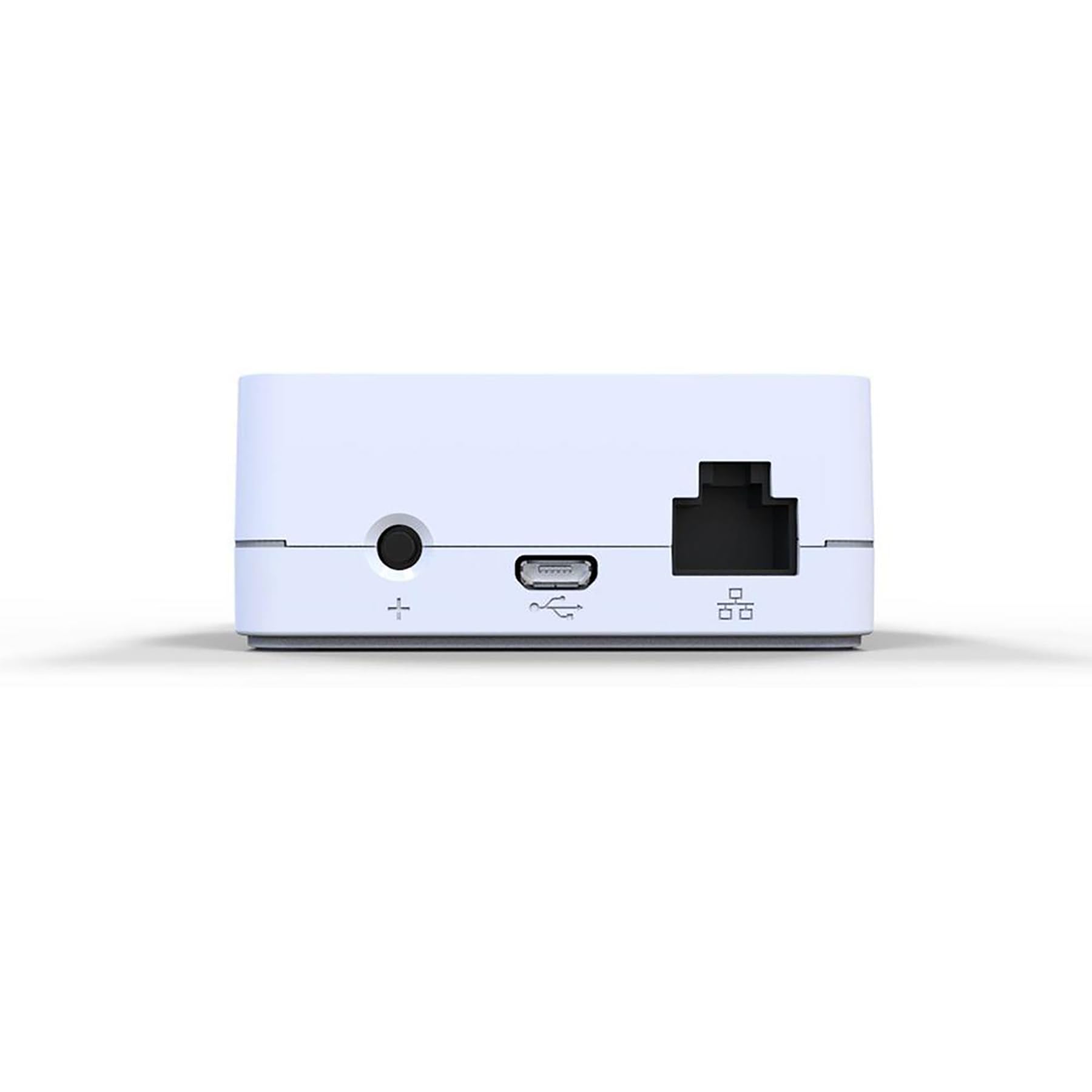 Lutron Caséta hub plugged in next to sofa showing seamless living room automation benefit