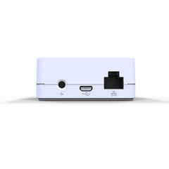 Lutron Caséta hub plugged in next to sofa showing seamless living room automation benefit