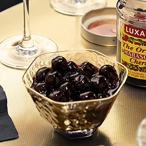 luxardo syrup pouring from can showcasing glossy syrup for cocktail sweetening