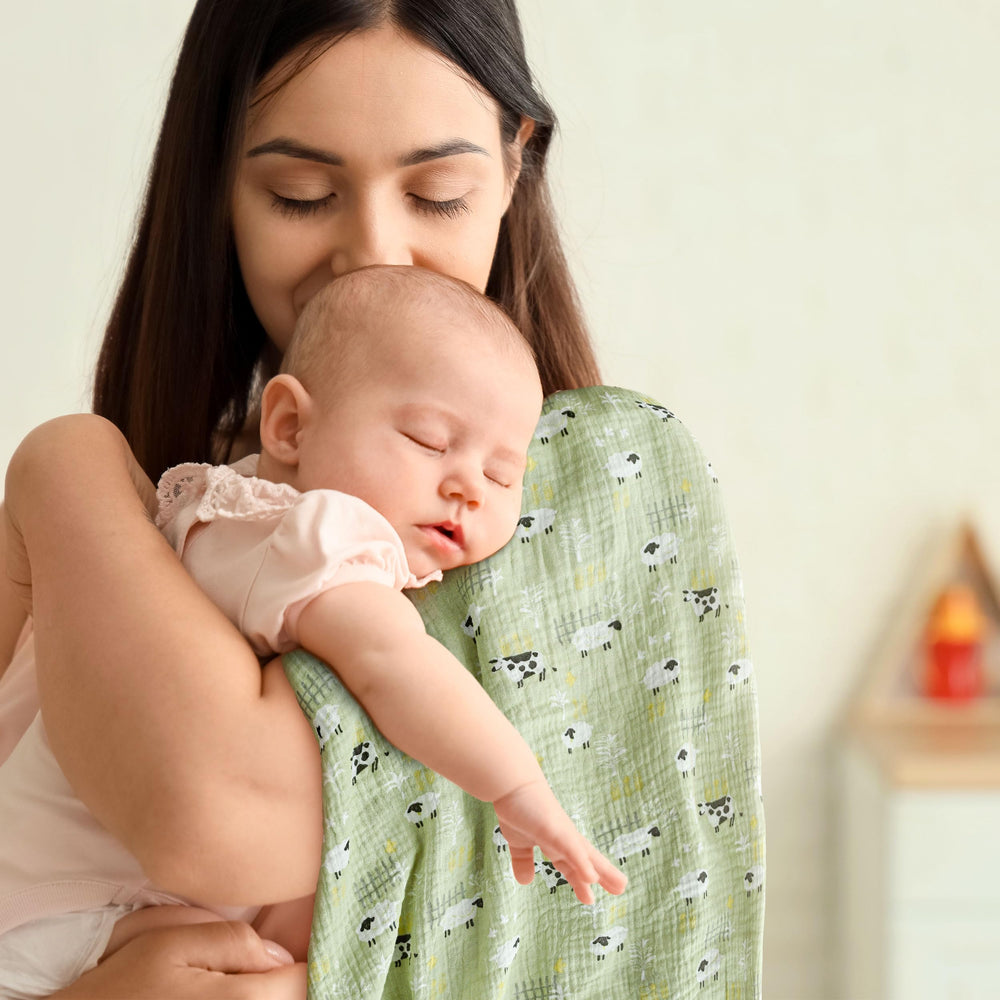 LYRICHOM BABY blanket wrapped around newborn demonstrating secure swaddling comfort