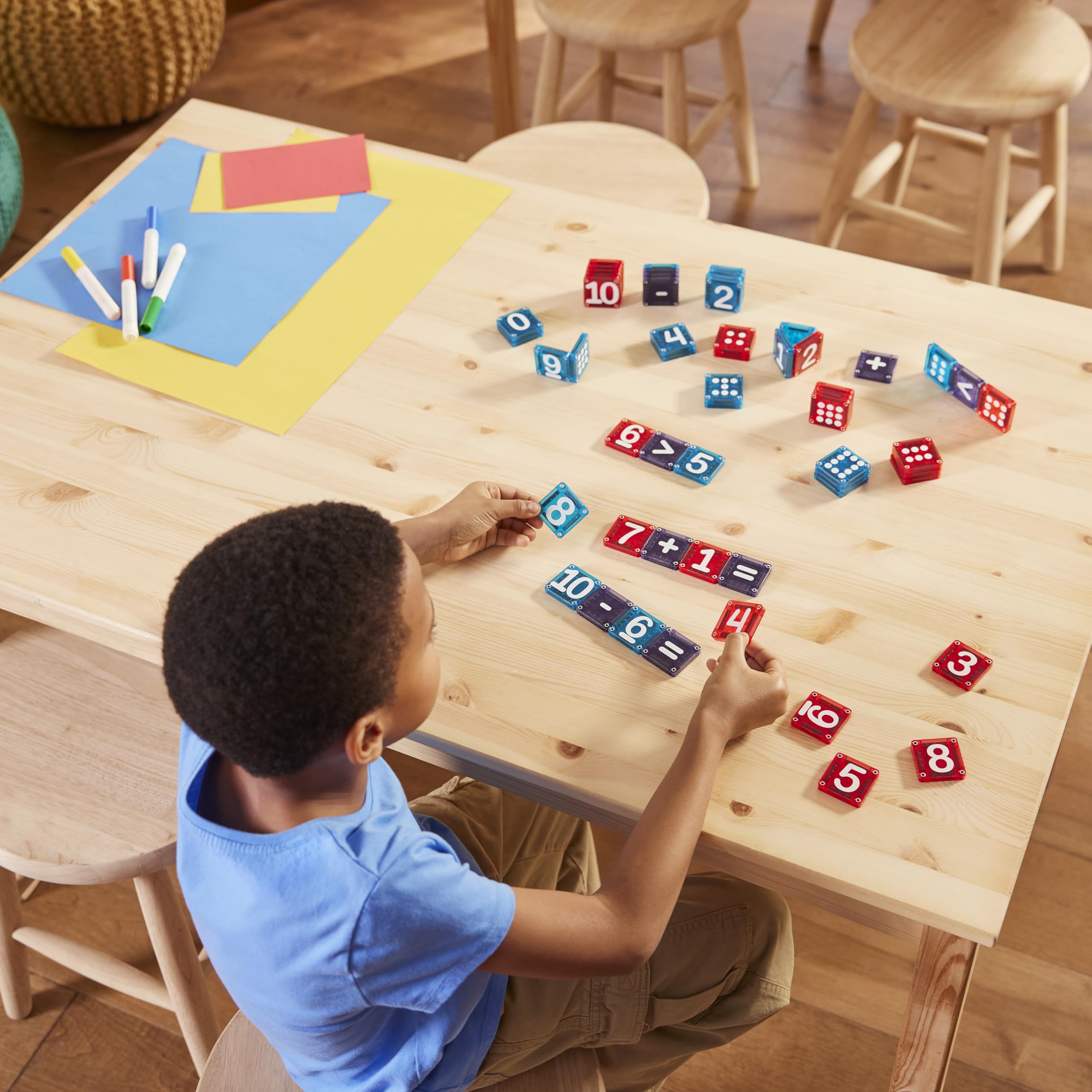 MAGNA-TILES classroom station with children using microMAGS to practice counting