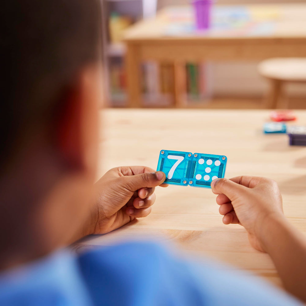 MAGNA-TILES microMAGS attached to larger tiles to extend learning and creativity