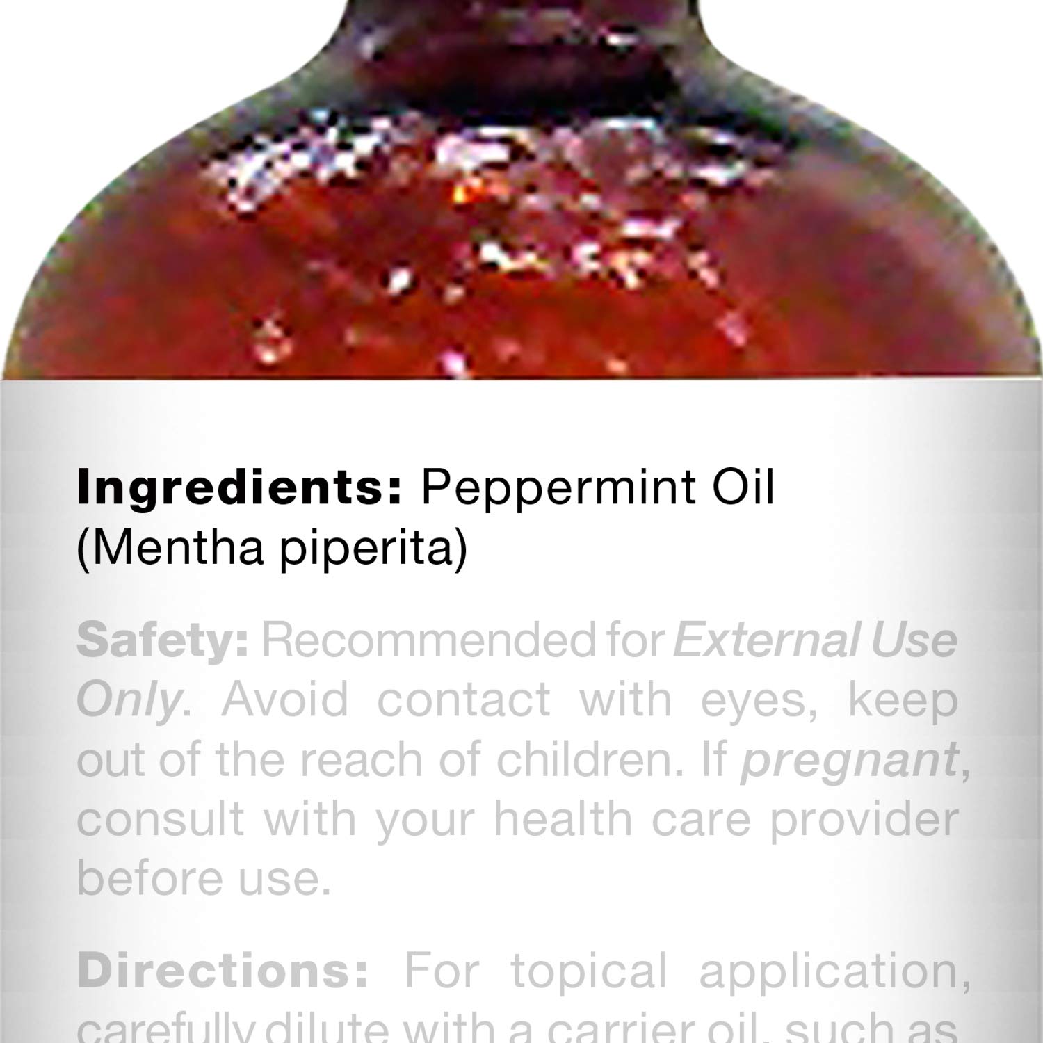 Majestic Pure dropper dispensing precise peppermint oil dose for controlled use