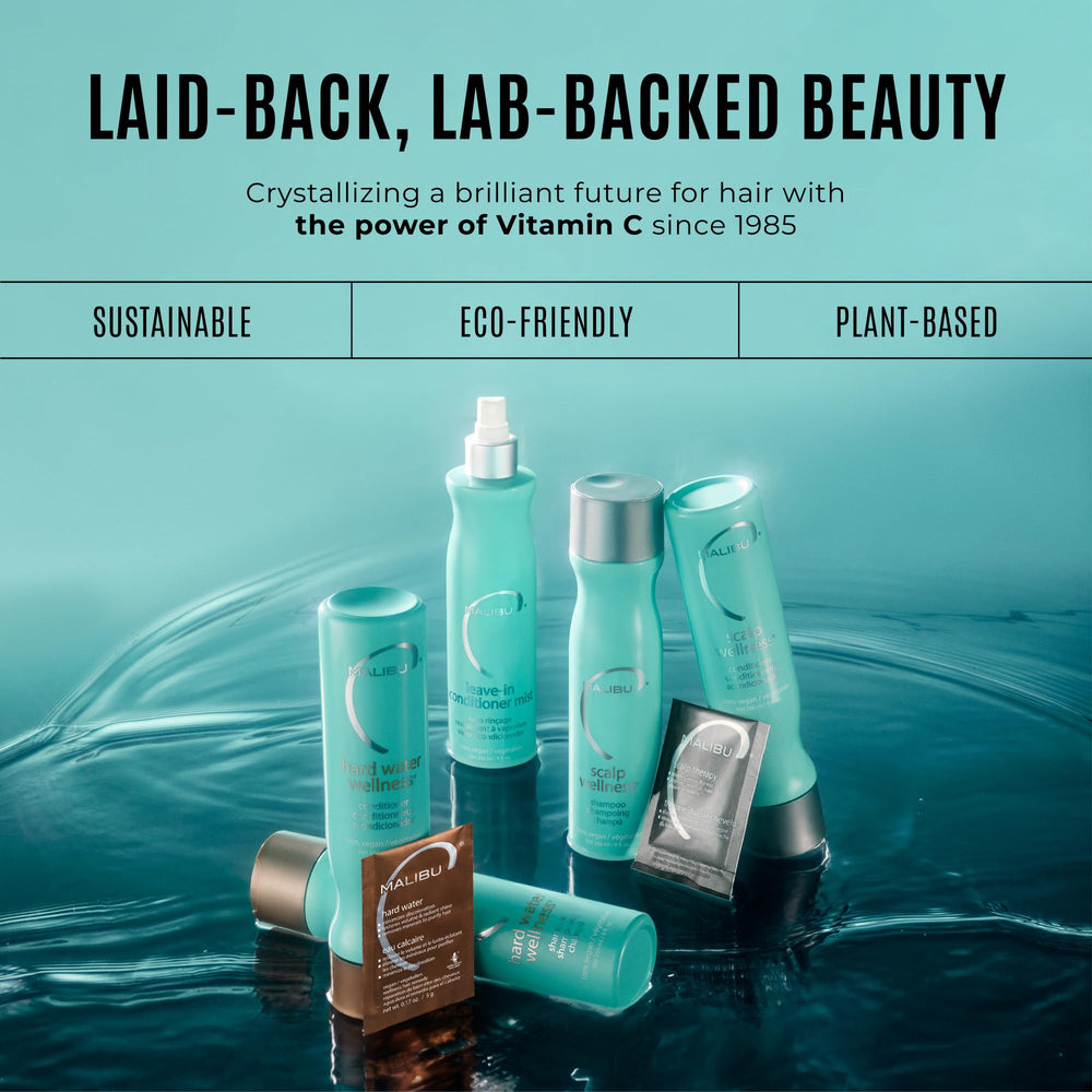 Malibu C shampoo being rinsed from hair illustrating effective mineral removal benefit