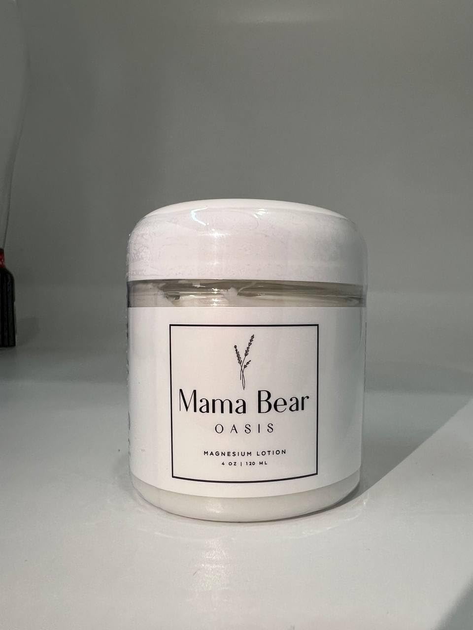 Mama Bear Oasis cream texture close-up showing smooth non-greasy finish
