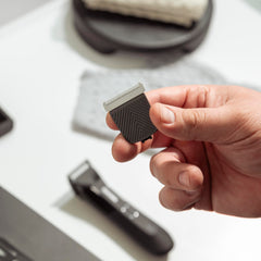 MANSCAPED blade edge texture detail showing corrosion-resistant surface
