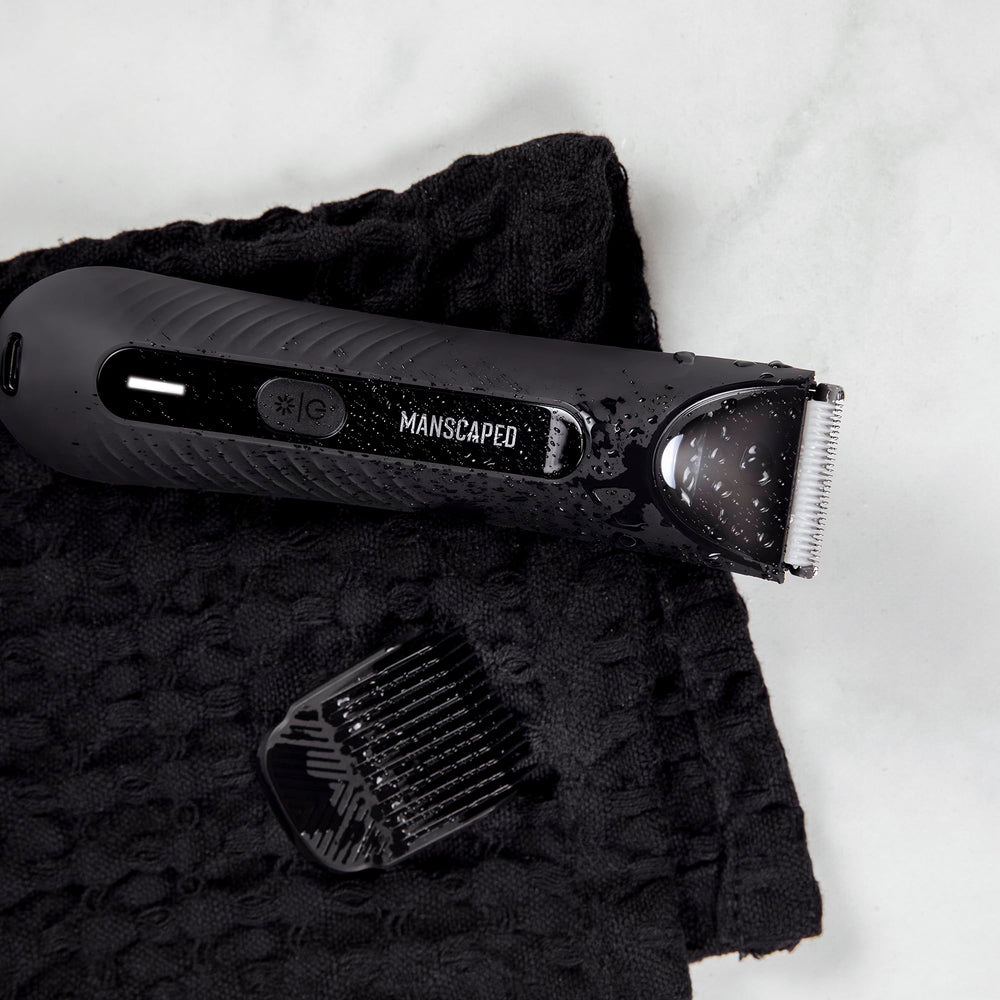 MANSCAPED handheld size comparison demonstrating portable grooming convenience