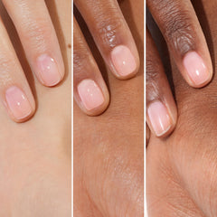 Manucurist on fingernails in everyday setting showing natural rosy-tinted glow