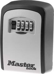 Master Lock 5401D front view showing compact black and silver exterior and neat profile