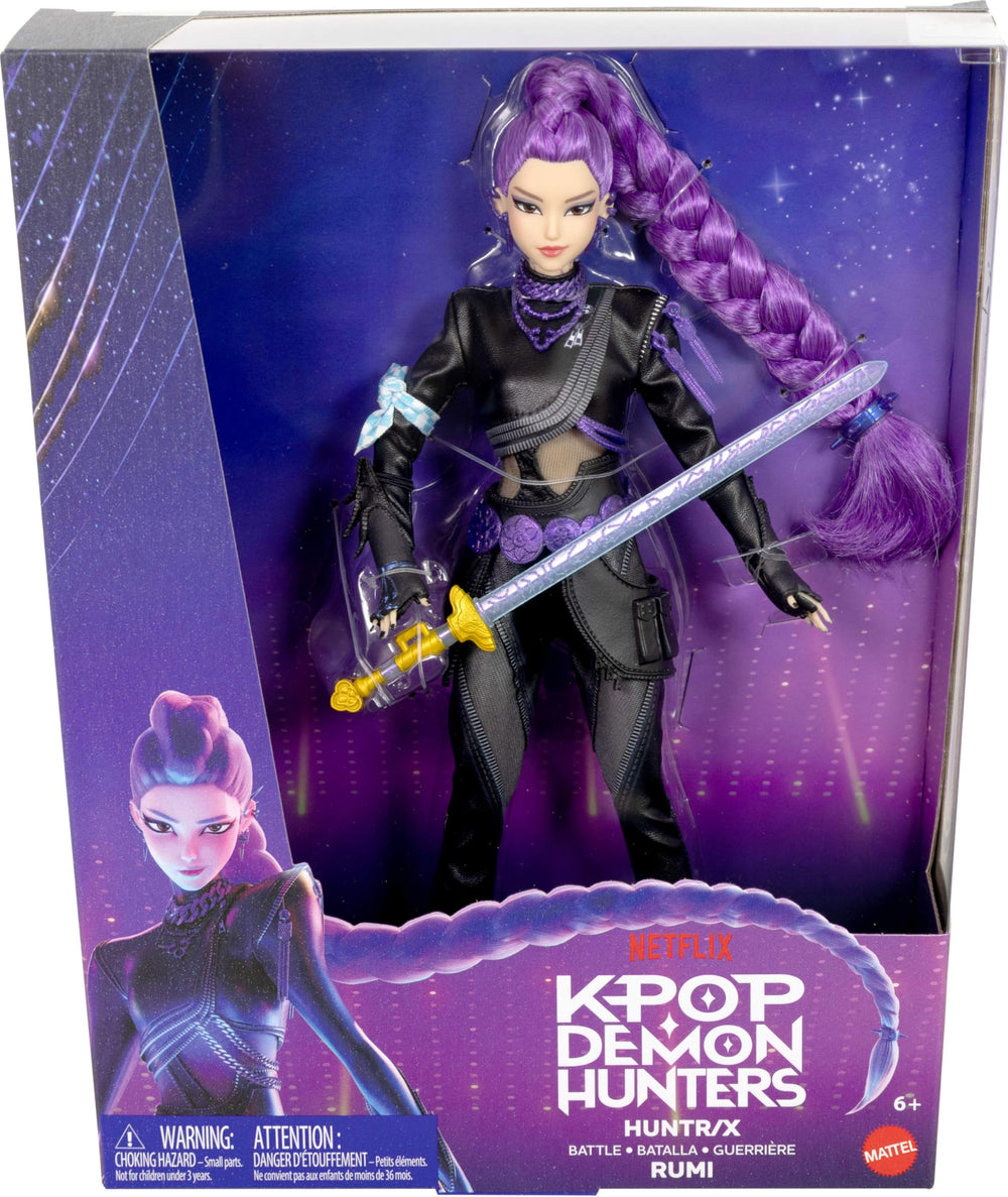 Mattel Rumi next to ruler and packaging showing scale and collector-ready box