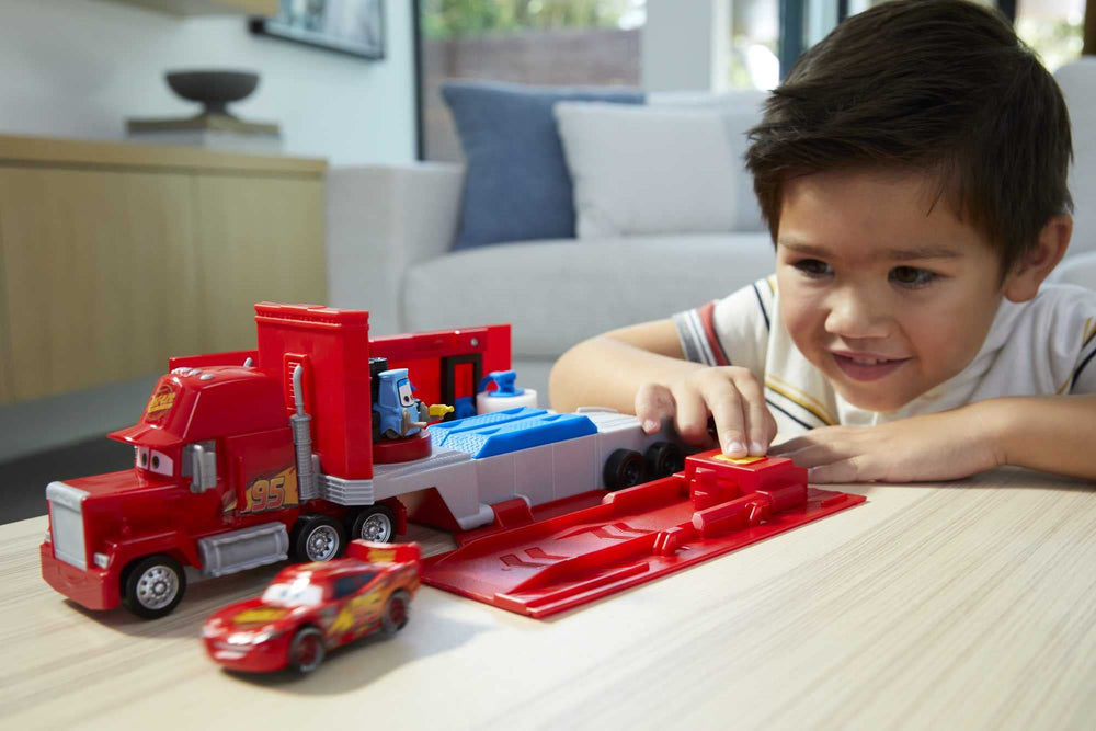 Mattel transforming Mack in child’s hands during play inspiring creative stories