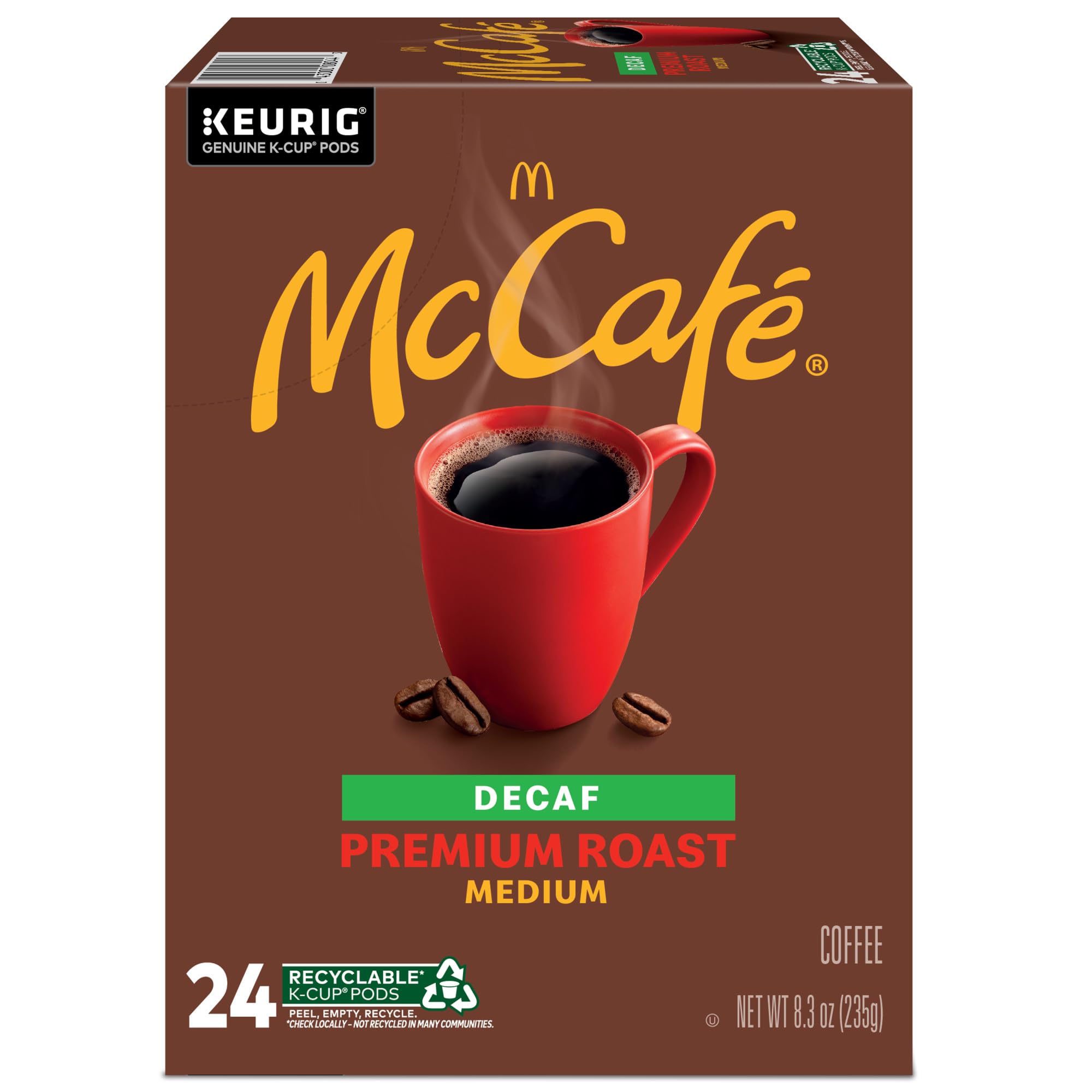 McCafé pod next to a standard mug to show serving size and scale